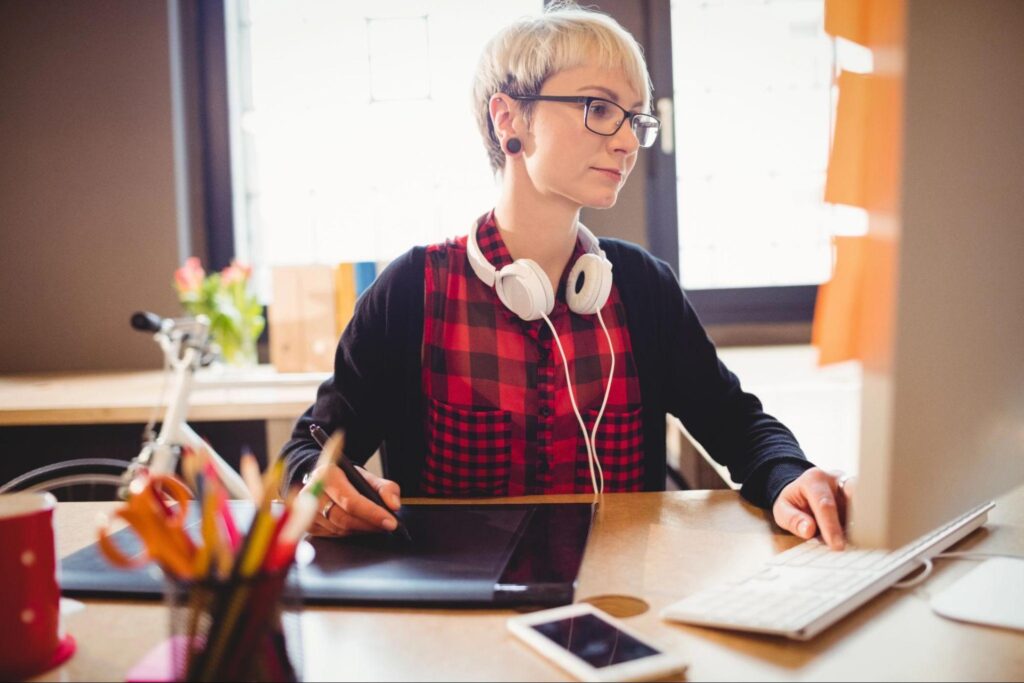 Female graphic designer working on a tablet